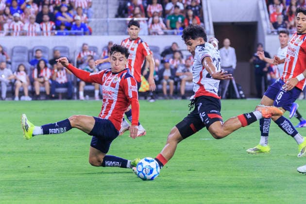 March 29, 2026, Los Angeles, California, USA: Manuel Capasso 28 of the Atlas FC makes a goal attempt as Miguel GoÂ³mez 24 of the Chivas de Guadalajara defends during the Clasico Tapatio game on Sunday March 29, 2026 at the BMO Stadium in Los Angeles, California. Chivas defeats Atlas FC, 1-0. ARIANA RUIZ PI Los Angeles USA - ZUMAp124 20260329_zaa_p124_057 Copyright: xArianaxRuizx