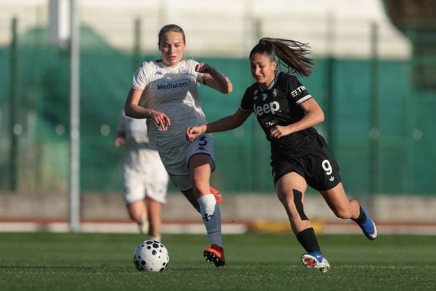 Biella, Italy, 29th March 2026. Oda Johansen of AFC Fiorentina tussles with Chiara Beccari of Juventus during the Juventus Women vs Fiorentina Women Coppa Italia Femminile Semi Final 2nd leg match at Stadio Vittorio Pozzo, Biella. Picture credit should read: Jonathan Moscrop Sportimage EDITORIAL USE ONLY. No use with unauthorised audio, video, data, fixture lists, club league logos or live services. Online in-match use limited to 120 images, no video emulation. No use in betting, games or single club league player publications. SPI_015_JM_JUVE_FIORENTINA_FEMM_CI SPI-4623-0015