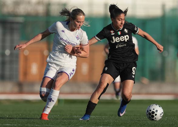 Biella, Italy, 29th March 2026. Oda Johansen of AFC Fiorentina tussles with Chiara Beccari of Juventus during the Juventus Women vs Fiorentina Women Coppa Italia Femminile Semi Final 2nd leg match at Stadio Vittorio Pozzo, Biella. Picture credit should read: Jonathan Moscrop Sportimage EDITORIAL USE ONLY. No use with unauthorised audio, video, data, fixture lists, club league logos or live services. Online in-match use limited to 120 images, no video emulation. No use in betting, games or single club league player publications. SPI_016_JM_JUVE_FIORENTINA_FEMM_CI SPI-4623-0016