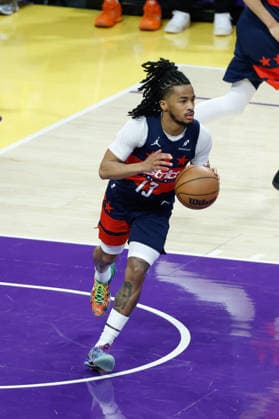 LOS ANGELES, CA - MARCH 30: Washington Wizards guard Sharife Cooper (13) dribbles the ball during the Washington Wizards vs Los Angeles Lakers game on March 30, 2026, at Crypto.com Arena in Los Angeles, CA. (Photo by Jevone Moore Icon Sportswire) NBA, Basketball Herren, USA MAR 30 Washington Wizards at Los Angeles Lakers EDITORIAL USE ONLY Icon20260330001