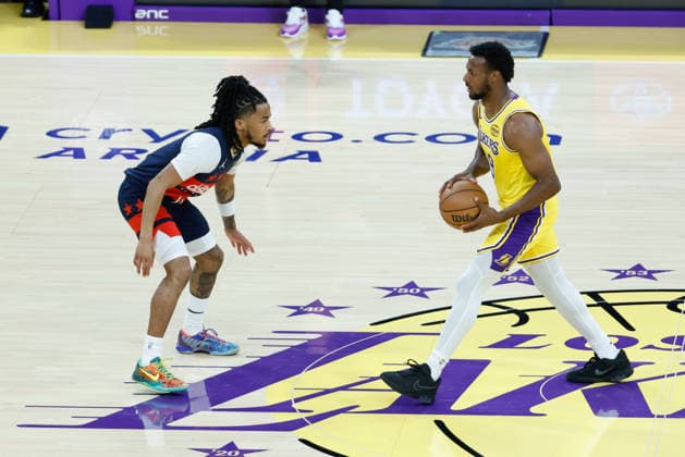 LOS ANGELES, CA - MARCH 30: Los Angeles Lakers guard Bronny James (9) guarded by Washington Wizards guard Sharife Cooper (13) during the Washington Wizards vs Los Angeles Lakers game on March 30, 2026, at Crypto.com Arena in Los Angeles, CA. (Photo by Jevone Moore Icon Sportswire) NBA, Basketball Herren, USA MAR 30 Washington Wizards at Los Angeles Lakers EDITORIAL USE ONLY Icon20260330002