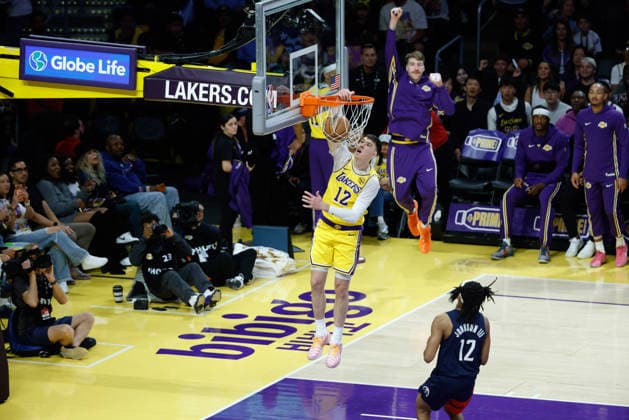 LOS ANGELES, CA - MARCH 30: Los Angeles Lakers forward Jake LaRavia (12) goes up for a dunk during the Washington Wizards vs Los Angeles Lakers game on March 30, 2026, at Crypto.com Arena in Los Angeles, CA. (Photo by Jevone Moore Icon Sportswire) NBA, Basketball Herren, USA MAR 30 Washington Wizards at Los Angeles Lakers EDITORIAL USE ONLY Icon20260330021