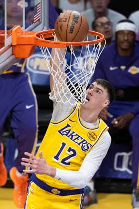 March 30, 2026, Los Angeles, California, United States: Los Angeles Lakers™ Jake LaRavia (12) dunks against the Washington Wizards during an NBA, Basketball Herren, USA basketball game at Crypto.com Arena on Monday, March 30, 2026 in Los Angeles. Los Angeles United States - ZUMAs197 20260330_aaa_s197_160 Copyright: xRingoxChiux