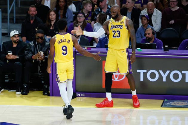 LOS ANGELES, CA - MARCH 30:Los Angeles Lakers forward LeBron James (23) tags his son Los Angeles Lakers guard Bronny James (9) out during the Washington Wizards vs Los Angeles Lakers game on March 30, 2026, at Crypto.com Arena in Los Angeles, CA. (Photo by Jevone Moore Icon Sportswire) NBA, Basketball Herren, USA MAR 30 Washington Wizards at Los Angeles Lakers EDITORIAL USE ONLY Icon20260330063