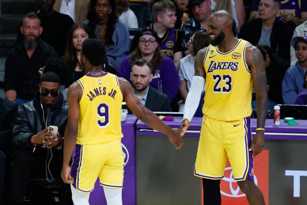 LOS ANGELES, CA - MARCH 30:Los Angeles Lakers forward LeBron James (23) signals get out to Los Angeles Lakers guard Bronny James (9) laughing during the Washington Wizards vs Los Angeles Lakers game on March 30, 2026, at Crypto.com Arena in Los Angeles, CA. (Photo by Jevone Moore Icon Sportswire) NBA, Basketball Herren, USA MAR 30 Washington Wizards at Los Angeles Lakers EDITORIAL USE ONLY Icon20260330064