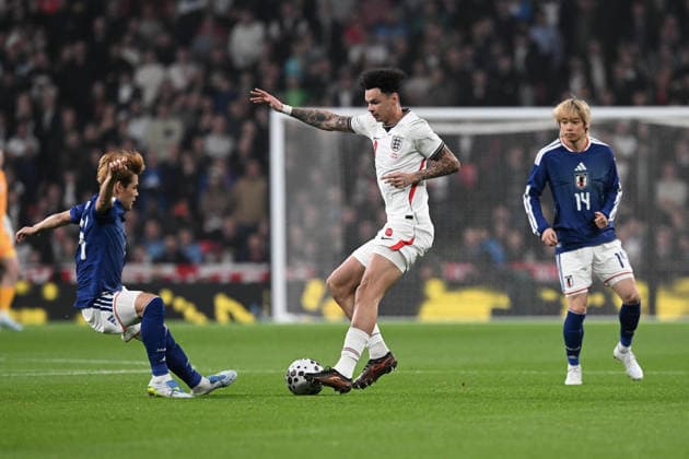 England v Japan, Friendly Nico O Reilly of England on the attack battles for possession with Kaishu Sano of Japan during the Friendly match between England and Japan at Wembley Stadium, London, UK on 31 March 2026. London Wembley Stadium Greater London UK Editorial use only , Copyright: xGrahamxHuntx PSI-23978-0051