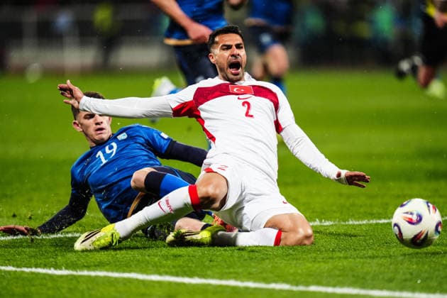 Kosovo v Turkiye - 2026 FIFA World Cup, WM, Weltmeisterschaft, Fussball European Qualifiers PRISTINA, KOSOVO - MARCH 31: Zeki Celik (2) of Turkiye in action against Dion Gallapeni (19) of Kosovo during the 2026 FIFA World Cup Europe Qualifiers play-off final match between Kosovo and Turkiye at the Fadil Vokrri Stadium in Pristina, Kosovo, on March 31, 2026. Hakan Akgun Anadolu Pristina Kosovo. Editorial use only. Please get in touch for any other usage.  Copyright: x2026xAnadoluxHakanxAkgunx