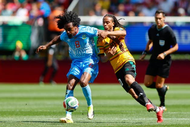 FIFA World Cup, WM, Weltmeisterschaft, Fussball 2026 play-off tournament - DR Congo vs Jamaica Samuel Moutoussamy (L) of DR Congo vies for the ball with Bobby De Cordova-Reid (R) of Jamaica during the 2026 FIFA World Cup playoff soccer match between the Democratic Republic of the Congo and Jamaica, in Guadalajara, Mexico, 31 March 2026. GUADALAJARA Mexico  Copyright: xFRANCISCOxGUASCOx