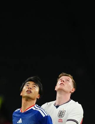Elliot Anderson of England and Kaoru Mitoma of Japan England v Japan, International Football, Friendly, Football, Wembley Stadium, London, UK - 31 Mar 2026London Wembley Stadium United Kingdom EDITORIAL USE ONLY No use with unauthorised audio, video, data, fixture lists, club league logos or live services. Online in-match use limited to 120 images, no video emulation. No use in betting, games or single club league player publications. Copyright: xJavierxGarcia Shutterstockx 16808984jj