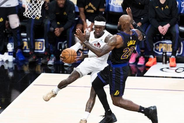 March 31, 2026, Los Angeles, California, USA: Cleveland CavaliersÃ¢â‚¬â ¢ Dennis Schroder (8) is defended by Los Angeles LakersÃ¢â‚¬â ¢ LeBron James (23) during an NBA, Basketball Herren, USA basketball game at Crypto.com Arena on Tuesday, March 31, 2026 in Los Angeles. NBA 2026: Cavaliers Vs Lakers  - ZUMAc68_ 20260331_zaf_c68_014 Copyright: xRingoxChiux