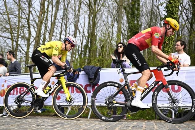 Belgian Wout van Aert of Team Visma-Lease a Bike and Danish William Blume Levy of Uno-X Mobility pictured in action during the men elite race of the Dwars Door Vlaanderen cycling event, 184,6km from Roeselare to Waregem, Wednesday 01 April 2026. JASPERxJACOBS  x169498445x