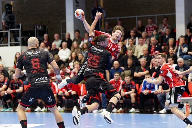 Fredericia Handball v MT Melsungen, EHF European League play-offs, Fredericia, Denmark Fredericia, Denmark. 31st, March 2026. William Andersson Moberg (31) of Fredericia Handball and Olle Forsell Schefvert (25) of MT Melsungen seen during the EHF European League play off match between Fredericia Handball and MT Melsungen at Middelfart Spraekasse Arena in Fredericia. Denmark, Fredericia  Copyright: xGonzalesxPhoto LauxNielsenx