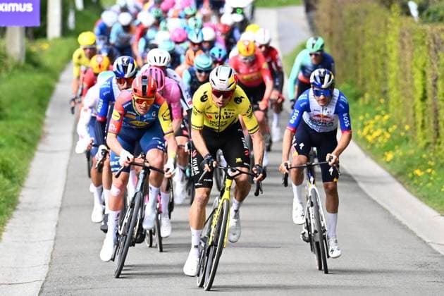 Dwars door Vlaanderen 2026 Cycling Race WAREGEM, BELGIUM - APRIL 01 : Pedersen Mads (DEN) of Lidl - Trek, Van Aert Wout (BEL) of Team Visma Lease a Bike during the 80th edition of Dwars door Vlaanderen an UCI World Tour 1.UWT one day cycling road race for Men Elite of 184 km with start in Roeselare and finish in Waregem on April 1, 2026 in Waregem, Belgium, 01 04 2026 ( Motordriver Kenny Verfaillie - Waregem Belgium  Copyright: xTomasxSiskx