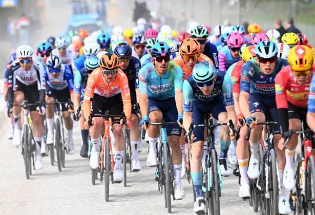 The pack of riders pictured in action during the men elite race of the Dwars Door Vlaanderen cycling event, 184,6km from Roeselare to Waregem, Wednesday 01 April 2026. POOLxTOMASxSISK  x169504850x