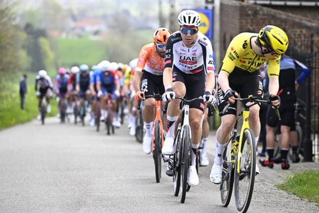 Belgian Florian Vermeersch of UAE Team Emirates-XRG and Belgian Wout van Aert of Team Visma-Lease a Bike pictured in action during the men elite race of the Dwars Door Vlaanderen cycling event, 184,6km from Roeselare to Waregem, Wednesday 01 April 2026. JASPERxJACOBS  x169505308x