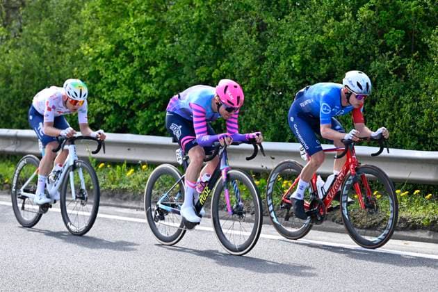 Dwars door Vlaanderen 2026 Cycling Race WAREGEM, BELGIUM - APRIL 01 : Gregoire Romain (FRA) of Groupama - FDJ United, Larsen Niklas (DEN) of Unibet Rose Rockets, Gachignard Thomas (FRA) of TotalEnergies during the 80th edition of Dwars door Vlaanderen an UCI World Tour 1.UWT one day cycling road race for Men Elite of 184 km with start in Roeselare and finish in Waregem on April 1, 2026 in Waregem, Belgium, 01 04 2026 ( Motordriver Kenny Verfaillie - Waregem Belgium  Copyright: xTomasxSiskx