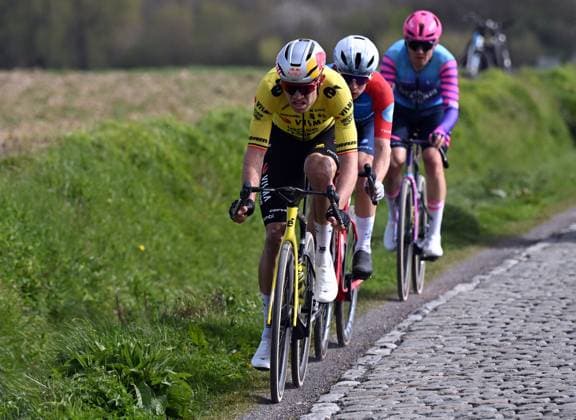 Danish Niklas Larsen of Unibet Rose Rockets, French Romain Gregoire of Groupama FDJ United and Belgian Wout van Aert pictured in action during the men elite race of the Dwars Door Vlaanderen cycling event, 184,6km from Roeselare to Waregem, Wednesday 01 April 2026. POOLxTOMASxSISK  x169507497x