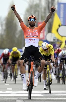 Italian Filippo Ganna of INEOS Grenadiers celebrates after winning the men elite race of the Dwars Door Vlaanderen cycling event, 184,6km from Roeselare to Waregem, Wednesday 01 April 2026. TOM GOYVAERTS TomxGoyvaerts  x169508819x