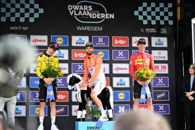 Dwars door Vlaanderen 2026 Cycling Race WAREGEM, BELGIUM - APRIL 01 : Van Aert Wout (BEL) of Team Visma Lease a Bike, Ganna Filippo (ITA) of INEOS Grenadiers and Waerenskjold Soren (NOR) of Uno-X Mobility pictured during the podium ceremony of the 80th edition of Dwars door Vlaanderen an UCI World Tour 1.UWT one day cycling road race for Men Elite of 184 km with start in Roeselare and finish in Waregem on April 1, 2026 in Waregem, Belgium, 01 04 2026 ( Motordriver Kenny Verfaillie - Waregem Belgium  Copyright: xTomasxSiskx