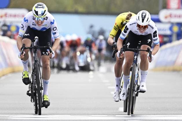 Swiss Marlen Reusser of Movistar Team, Dutch Lieke Nooijen of Team Visma-Lease a Bike and Dutch Demi Vollering of FDJ United-SUEZ cross the finish line of the women elite race of the Dwars Door Vlaanderen cycling event, 128,9km from Roeselare to Waregem, Wednesday 01 April 2026. TOM GOYVAERTS TomxGoyvaerts  x169521689x
