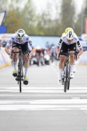 Swiss Marlen Reusser of Movistar Team, Dutch Lieke Nooijen of Team Visma-Lease a Bike and Dutch Demi Vollering of FDJ United-SUEZ cross the finish line of the women elite race of the Dwars Door Vlaanderen cycling event, 128,9km from Roeselare to Waregem, Wednesday 01 April 2026. TOM GOYVAERTS TomxGoyvaerts  x169521938x