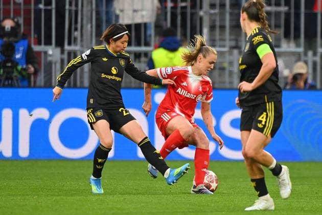 Georgia STANWAY FCB , action,duel against Hinata MIYAZAWA ManU Womens Champions League quarter-final FC Bayern Munich Manchester United on 01 04 2026 A L L I A N Z A R E N A