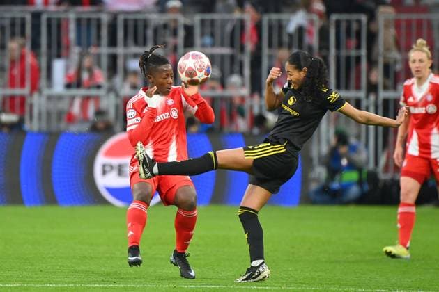 Jayde RIVIERE ManU , action,duel against Bernadette KAKOUNAN AMANI FCB Womens Champions League quarter-final FC Bayern Munich Manchester United on 01 04 2026 A L L I A N Z A R E N A