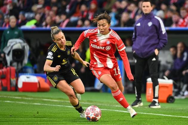 Momoko TANIKAWA FCB , action,duel against Julia Zigiotti OLME ManU Womens Champions League quarter-final FC Bayern Munich Manchester United on 01 04 2026 A L L I A N Z A R E N A