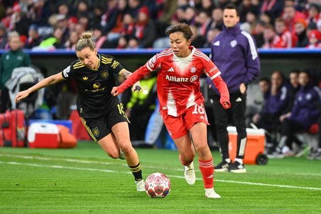 Momoko TANIKAWA FCB , action,duel against Julia Zigiotti OLME ManU Womens Champions League quarter-final FC Bayern Munich Manchester United on 01 04 2026 A L L I A N Z A R E N A