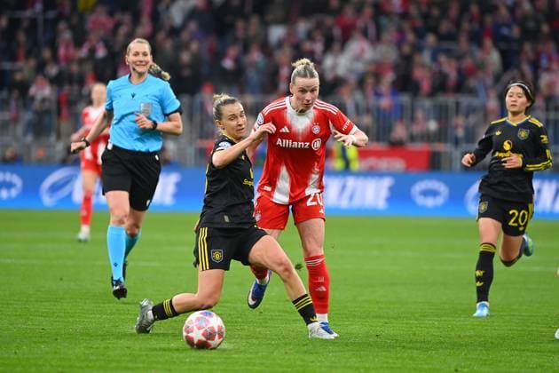 Franziska KETT FCB , action,duel against Julia Zigiotti OLME ManU , Womens Champions League quarter-final FC Bayern Muenchen Manchester United on 01 04 2026 A L L I A N Z A R E N A