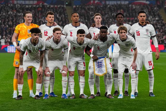 31st March 2026; Wembley Stadium, London, England; Friendly International Football, England versus Japan; Marc Gu& xe9;hi as Captain of England in the team photograph TomxMajor Content restricted for UK based newspaper