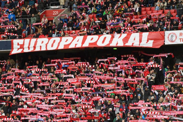 MUNICH, GERMANY - APRIL 1: Fans in the Sudkurve holding up their scarfs and singing beneath the Europapokal banner during the UEFA Womens Champions League quarter-final match between FC Bayern Munich and Manchester United, ManU at Allianz Arena in Munich, Germany. Copyright: xSvenxBeyrich SPPx Sportspressphoto_SPR122872