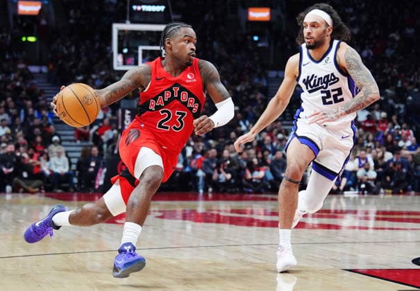 April 1, 2026, Toronto, On, CANADA: Toronto Raptors Jamal Shead (23) drives past Sacramento Kings Devin Carter (22) during first half NBA, Basketball Herren, USA basketball action in Toronto on Wednesday, April 1, 2026. Canada News - April 1, 2026  - ZUMAc35_ 20260401_zaf_c35_097 Copyright: xFrankxGunnx