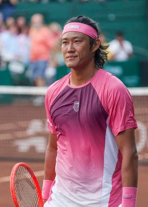 HOUSTON, TX - APRIL 01: Zhizhen Zhang (CHN) walks to the other side of the court in the singles round of 16 match at the Men™s Clay Court Championship on April 1, 2026 at River Oaks Country Club in Houston, TX. (Photo by Leslie Plaza Johnson Icon Sportswire) TENNIS: APR 01 US Men s Clay Court Championship EDITORIAL USE ONLY Icon260401138