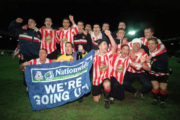 Bury V Sunderland, League Division One Thomas Sorensen, Paul Butler, Andy Melville, Michael Gray, Chris Makin, Nicky Summerbee, Kevin Ball, Lee Clarke, Allan Johnston, Kevin Phillips and Niall Quinn of Sunderland celebrate promotion after the League Division One match between Bury and Sunderland at Gigg Lane on April 13, 1999 in Bury, England. Bury Gigg Lane England United Kingdom Copyright: xAllstarxPicturexLibraryxLtdx
