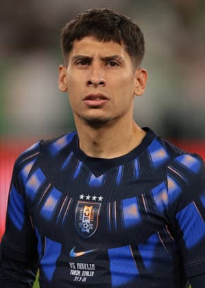 Turin, Italy, 31st March 2026. Mathias Olivera of Uruguay looks on during the line up prior to the Algeria vs Uruguay International Friendly, Länderspiel, Nationalmannschaft match at Allianz Stadium, Turin. Picture credit should read: Jonathan Moscrop Sportimage EDITORIAL USE ONLY. No use with unauthorised audio, video, data, fixture lists, club league logos or live services. Online in-match use limited to 120 images, no video emulation. No use in betting, games or single club league player publications. SPI_127_JM_ALGERIA_URUGUAY SPI-4625-0127