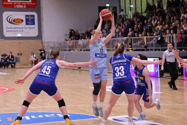 02 04 2026, Basketball, Women, Season 2025 2026, Toyota Womens Basketball Bundesliga, Playoffs, Saarlouis Royals Basketball Club Marburg e V , Egle Zabotkaite Saarlouis Royals , Allyson Fertig Basketball Club Marburg e V , Greta Kampschroeder Basketball Club Marburg e V Saarlouis Stadtgartenhalle Saarland Germany DEU Copyright: xSebastianxBachx