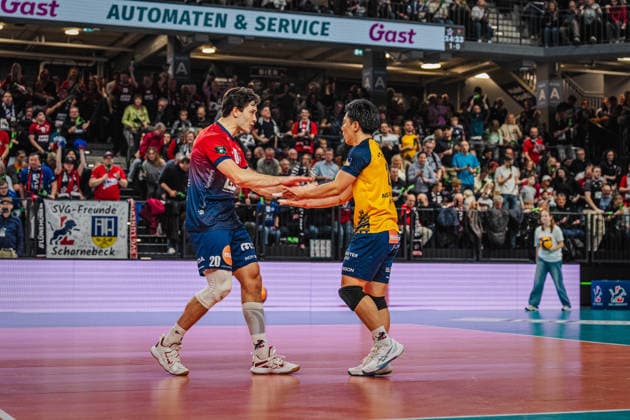 Volleyball Mens CEV Cup 2026 semi-final SVG Lüneburg vs VC Greenyard MAASEIK 02 04 2026 Ethan Champlin 20 SVG Lüneburg high-fives Sho Takahashi 21 SVG Lüneburg