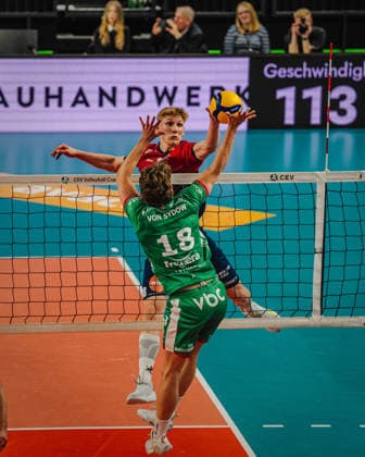 Volleyball Mens CEV Cup 2026 semi-final SVG Lüneburg vs VC Greenyard MAASEIK 02 04 2026 Axel Larsen 18 SVG Lüneburg against the block of Oskar von Sydow 18 Greenyard Maaseik