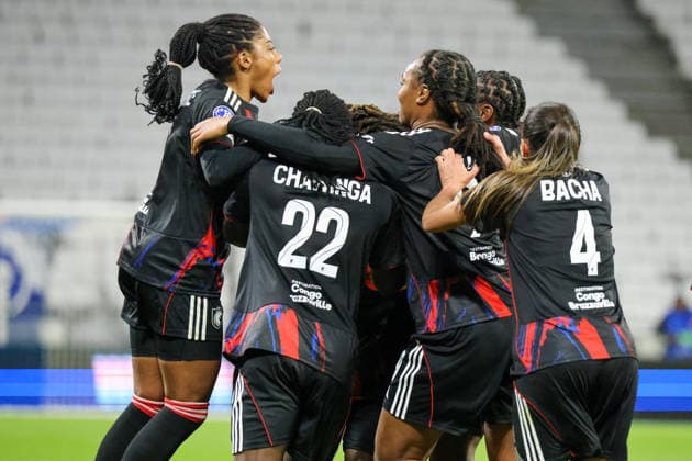 Lyon, France 02 April 2026 UEFA Women™s Champions League quarter-final second leg OL Lyonnes vs VfL Wolfsburg Women In the picture scorer Melchie Dumornay OL Lyonnes , hidden in the picture, scores the 2-0 goal for Lyon and cheers with her teammates Copyright: HMBxMedia MadeleinexFantini