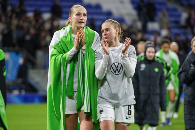 Lyon, France 02 April 2026 UEFA Women™s Champions League quarter-final second leg OL Lyonnes vs VfL Wolfsburg Women In the picture from left Camilla Küver Kuever VfL and Janina Minge VfL disappointed after the defeat against Olympique Lyon and the elimination from the UEFA Women™s Champions League Copyright: HMBxMedia MadeleinexFantini
