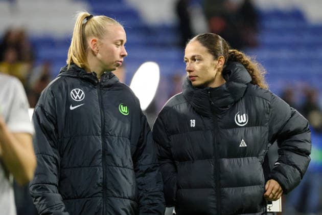 Lyon, France 02 April 2026 UEFA Women™s Champions League quarter-final second leg OL Lyonnes vs VfL Wolfsburg Women In the picture from left Ella Peddemors VfL and Kessya Bussy VfL disappointed after the defeat against Olympique Lyon and the elimination from the UEFA Women™s Champions League Copyright: HMBxMedia MadeleinexFantini