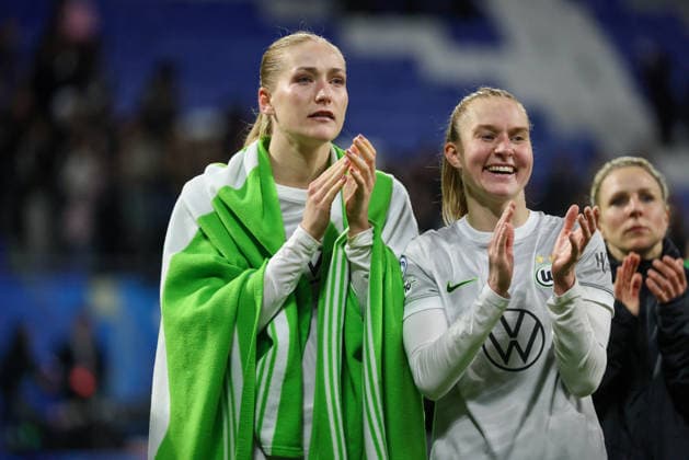 Lyon, France 02 April 2026 UEFA Women™s Champions League quarter-final second leg OL Lyonnes vs VfL Wolfsburg Women In the picture from left Camilla Küver Kuever VfL and Janina Minge VfL after the defeat against Olympique Lyon and the elimination from the UEFA Women™s Champions League Copyright: HMBxMedia MadeleinexFantini
