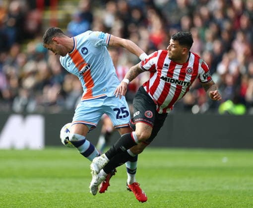Sheffield, England, 3rd April 2026. Joel Ward of Swansea City tussles with Gustavo Hamer of Sheffield United during the Sheffield United vs Swansea City Sky Bet Championship match at Bramall Lane, Sheffield. Picture credit should read: Simon Bellis Sportimage EDITORIAL USE ONLY. No use with unauthorised audio, video, data, fixture lists, club league logos or live services. Online in-match use limited to 120 images, no video emulation. No use in betting, games or single club league player publications. SPI_037_SB_Sheff_Utd_Swansea SPI-4660-0017