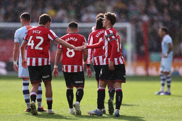 Sheffield, England, 3rd April 2026. Harrison Burrows of Sheffield United celebrates the third goal with Sydie Peck of Sheffield United during the Sheffield United vs Swansea City Sky Bet Championship match at Bramall Lane, Sheffield. Picture credit should read: Jake Youle Sportimage EDITORIAL USE ONLY. No use with unauthorised audio, video, data, fixture lists, club league logos or live services. Online in-match use limited to 120 images, no video emulation. No use in betting, games or single club league player publications. SPI_045_JY_Sheff_Utd_Swansea SPI-4660-0043