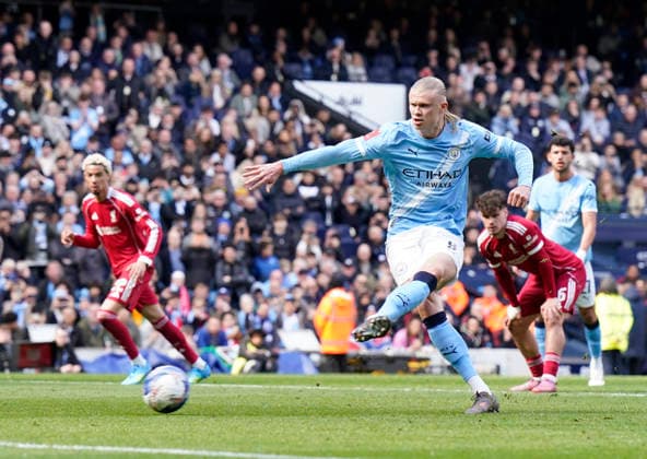 Manchester, England, 4th April 2026. Erling Haaland of Manchester City scoring the first goal from a penalty kick during the Manchester City vs Liverpool FA Cup quarter final match at the Etihad Stadium, Manchester. Picture credit should read: Andrew Yates Sportimage EDITORIAL USE ONLY. No use with unauthorised audio, video, data, fixture lists, club league logos or live services. Online in-match use limited to 120 images, no video emulation. No use in betting, games or single club league player publications. SPI_055_AY_Man_City_liverpool SPI-4668-0055
