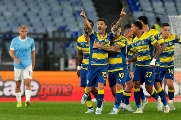 Enrico Delprato of Parma Calcio celebrates with team mates after scoring the goal of 0-1 during the Serie A 2025 2026 football match between SS Lazio and Parma Calcio at Stadio Olimpico in Rome (Italy), April 4, 2026. AntoniettaxBaldassarre