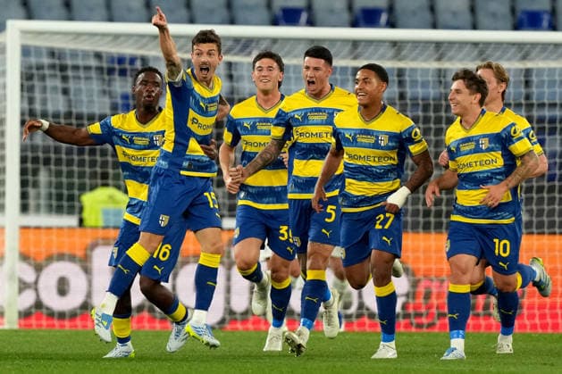 Enrico Delprato of Parma Calcio celebrates with team mates after scoring the goal of 0-1 during the Serie A 2025 2026 football match between SS Lazio and Parma Calcio at Stadio Olimpico in Rome (Italy), April 4, 2026. AntoniettaxBaldassarre