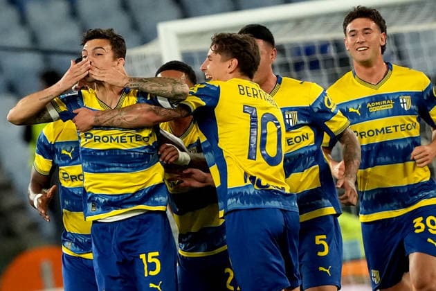 Enrico Delprato of Parma Calcio celebrates with team mates after scoring the goal of 0-1 during the Serie A 2025 2026 football match between SS Lazio and Parma Calcio at Stadio Olimpico in Rome (Italy), April 4, 2026. AntoniettaxBaldassarre