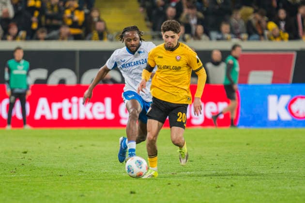 04 04 2026, xomx, Soccer 2 Bundesliga, Dynamo Dresden Hertha BSC Berlin v l Ben Justus Bobzien Dynamo Dresden and Deyo Deyovaisio Zeefuik Hertha BSC in a duel on the ball DFL DFB REGULATIONS PROHIBIT ANY USE OF PHOTOGRAPHS as IMAGE SEQUENCES and or QUASI VIDEO Dresden